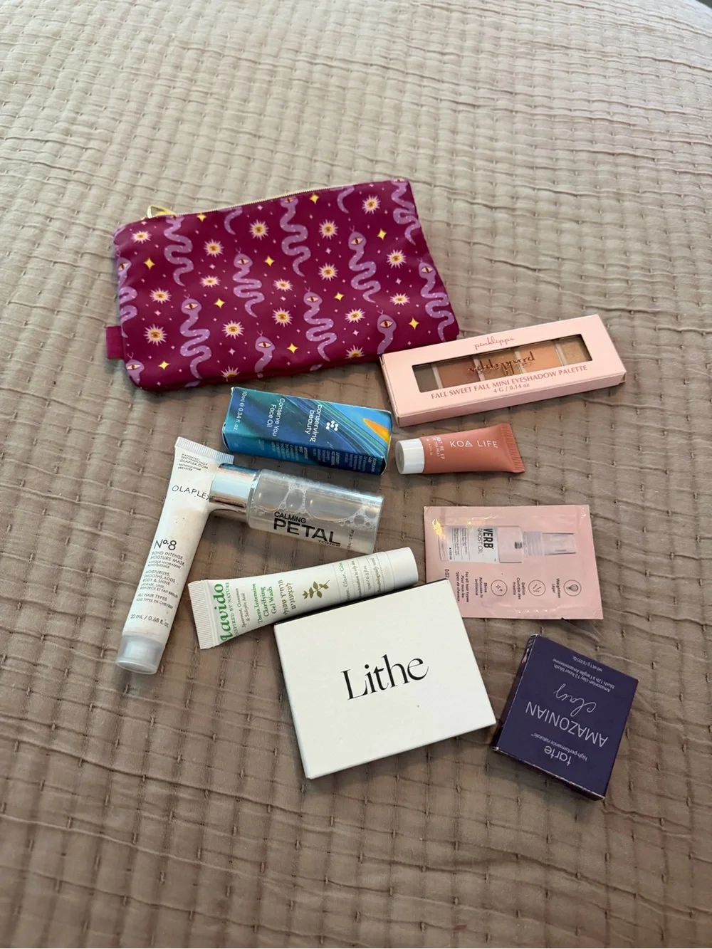 Mystery makeup bag with 5-8 pieces of new sealed, unexpired pieces of makeup
